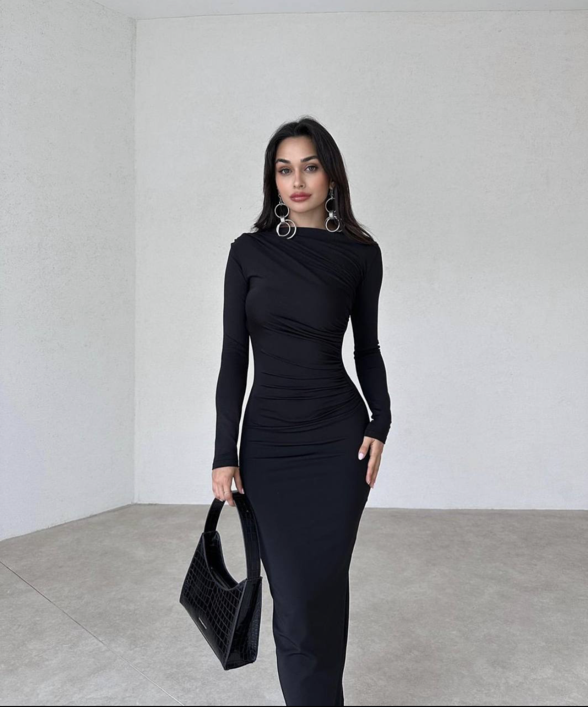 Ben Valor's Ruched Black Maxi Dress featuring Long Sleeves made of Polyester and Elastane. Perfect for any ocassion